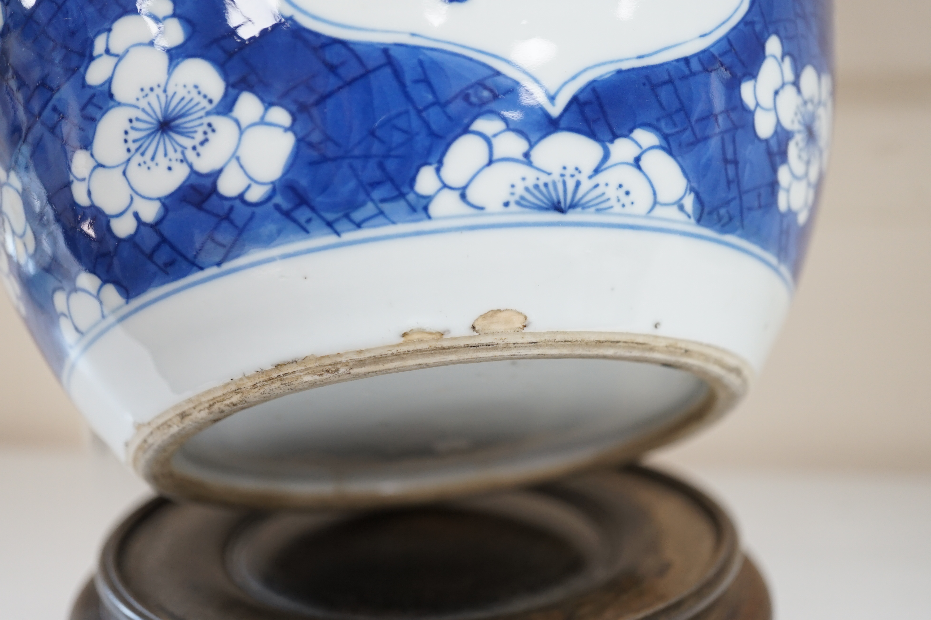 A Chinese blue and white ‘Antiques’ jar, Kangxi period, cracked